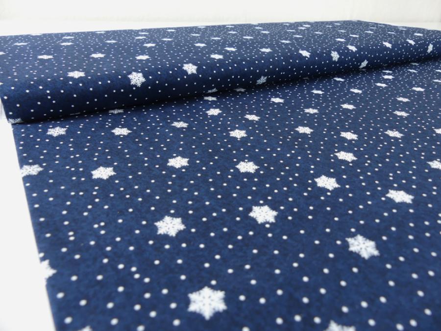 Patchworkstoff Schneesterne, blauer Untergrund